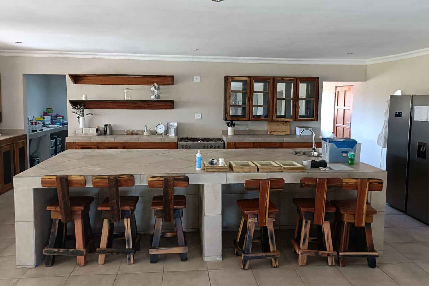 Spacious sleeperwood dining table with a smooth surface and sturdy legs, ideal for family gatherings and dinner parties.
